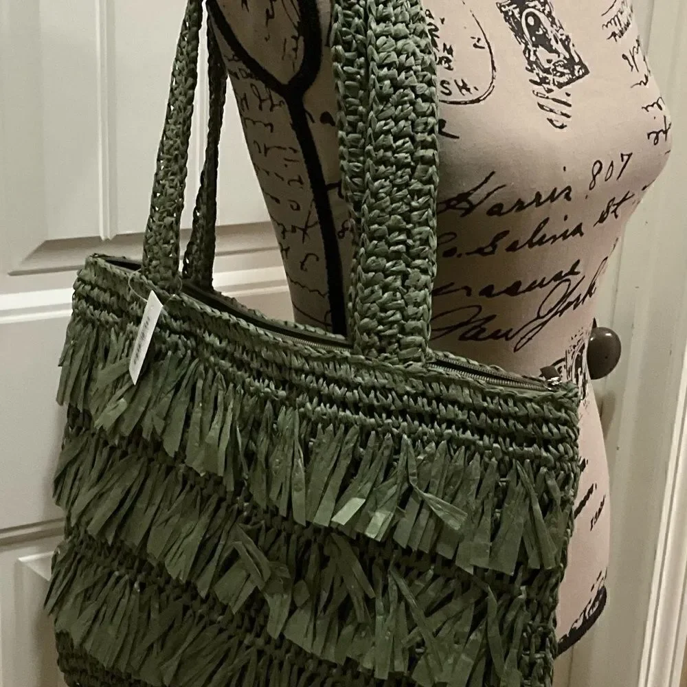 The Last Straw Fringe Straw Tote Bag. In Olive